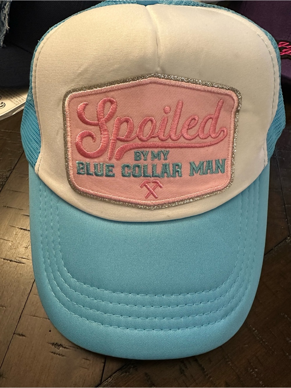 Spoiled by My Blue Collar Man Trucker Hat